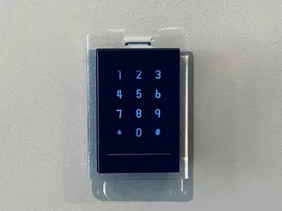 an alarm clock is attached to a wall at 503 Bohemian Romance Apartments in center city in Philadelphia