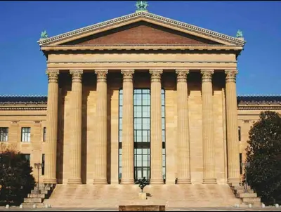 a large building with columns on top of it at 502 Luxury 1BR apartment in center city in Philadelphia