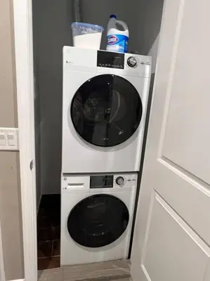 a white washer and dryer in a room at 505 Relaxing 1BR apartment in center city of Philly in Philadelphia