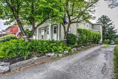 a house with trees and plants in the driveway at Cozy Dark & Moody Home New Reno 10 mins to Lanc in Mountville