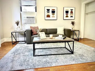 a living room with a couch and a coffee table at Lennox C409 Peaceful & Perfect Private 1-Br in Philadelphia