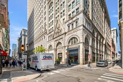 a ups truck parked in front of a building at Charming Home In Heart of City With King Size Bed! in Philadelphia
