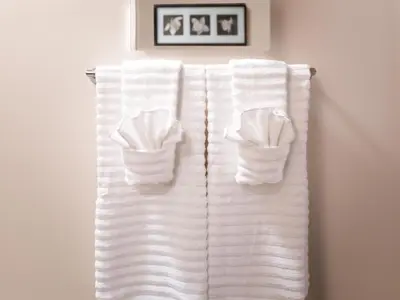 a group of towels hanging on a towel rack at 2BR 1BA Apartment near Rittenhouse Square apts in Philadelphia