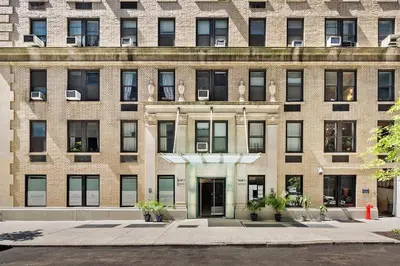 a large brick building with a door in front at 73-1204 New Studio UWS Doorman Gym in New York