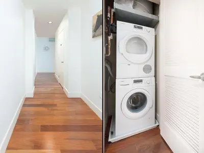 a laundry room with a washer and dryer at Cozy Fully Furnished 2 Bedroom 2 Bathroom Apartment apts in Philadelphia