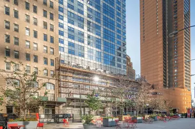 a group of tall buildings in a city at Financial District 1br w WD gym elevator NYC-1362 in New York