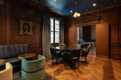 a dining room with a table and chairs at FiDi 1br w game room resident-only speakeasy NYC-1346 in New York