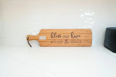 a wooden bench with a sign that reads black our lives wherever we happen at Very Comfy Farmhouse Apartment Unit A, 1st FL in Lancaster