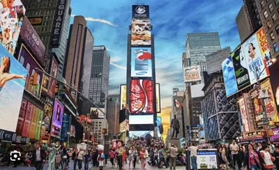 a crowd of people walking down a busy city street at Apartment near Times Square UWS Manhattan in New York
