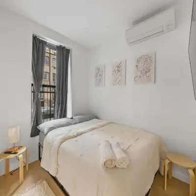Oasis Room at a Shared Apartment by Times Square