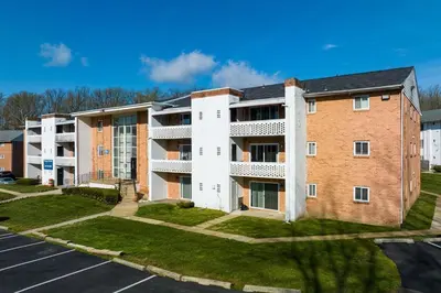 an apartment building with a parking lot at Chateau 506 Stunning In Wilmington, Free Parking! in Wilmington