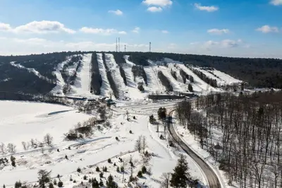 an aerial view of a ski slope in the snow at Marvel at Midlake in Lake Harmony