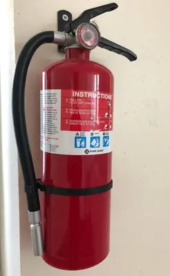 a red fire hydrant is attached to a wall at Large and private 3 bedroom and 1 bathroom apartment near Newark International Airport EWR and New York City, MetLife Stadium FIFA World Cup 20 minutes away in Newark