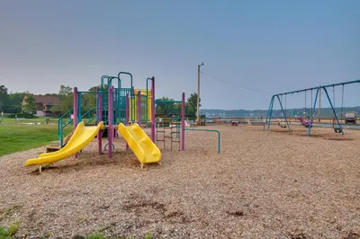 a playground with a slide in a park at 7 Mi to Big Boulder Resort-Style Poconos Retreat in Albrightsville