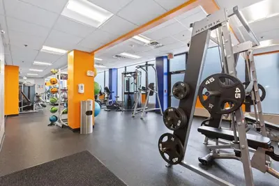a gym with treadmills and a treadmill at PP 1306 Modern Corporate 1br, pool, Gym in Harrisburg