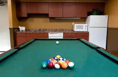 a pool table with a pile of balls on it at PP 2312 Modern Corporate 1br, pool, Gym in Harrisburg