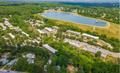 an aerial view of a park next to a lake at Pine Brook 104 I Pool Gym I Free Parking ! in Newark