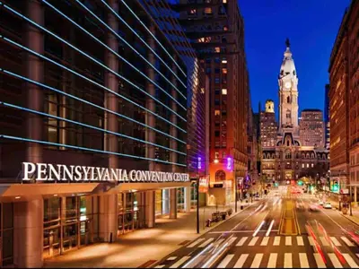a city street at night with a clock tower at 406 Luxury KING BED in central city of Philad in Philadelphia