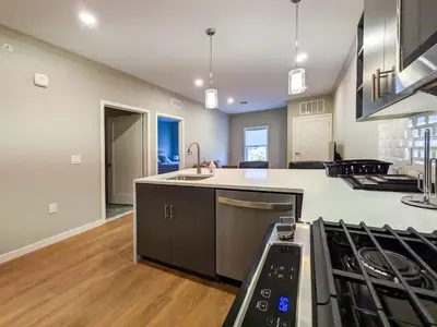 a kitchen with a sink and a stove at 224 Brand New 1 Bedroom 1 Bath 1 Kitchen 1 Liv in Dunellen
