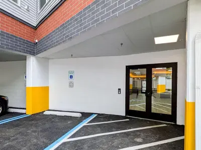 an empty parking lot with a door in a building at 315 Brand New 1 Bedroom 1 Bath 1 Full Kit 1 Liv in Dunellen