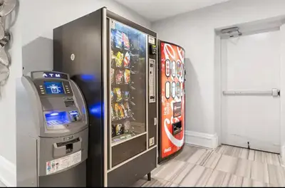 a video game machine next to a video game console at XL Studio - Metro Studio, Chic Stay in Philadelphia