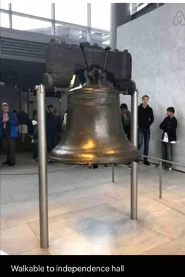 a large bell is on display in a building at New - Suite by Rittenhouse Square in Philadelphia