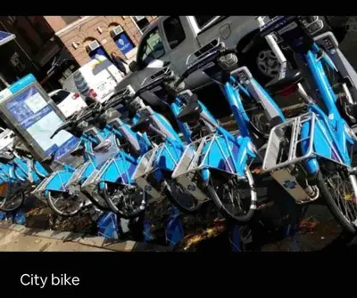 a group of motorcycles parked in a parking lot at Downtown City Hall near Kimmel Center 2BD Suite in Philadelphia