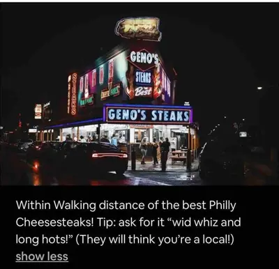 a sign for a restaurant on a city street at night at New - Suite nearby Rittenhouse Square in Philadelphia