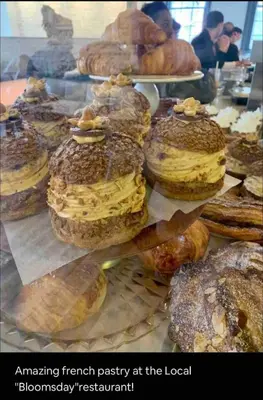 a bunch of pastries on display in a bakery at Rittenhouse Square near Kimmel Center Studio in Philadelphia