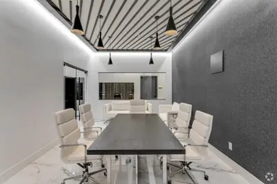 a dining room with a table and white chairs at Market View Residence 504 I 2 Bedroom 2 Bathroom in Wilmington