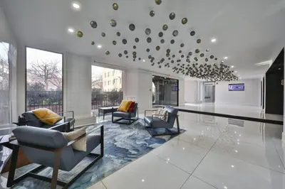 a living room with couches and chairs in a building at Fairfax Apartments 303 Spacious 1 Bed 1 Bth in Philadelphia