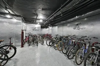 a bunch of bikes parked in a garage at Fairfax Apartments 725 Spacious 1 Bed 1 Bth in Philadelphia