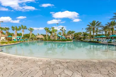 a large swimming pool at a resort with palm trees at MYR1471 in Philadelphia