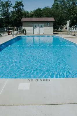 a no driving sign in front of a swimming pool at New House within Campground in Mifflinburg