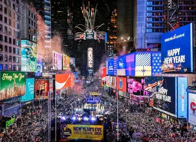 a crowd of people in a city at night at Free Parking 1BR Spacious BoHo 30Min to NYC in Bayonne