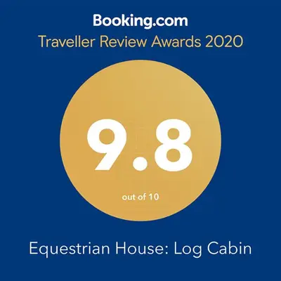 a yellow circle with the words eyelash technician house log cabin at Home Away from the City Close to Ski Trails in Pleasant Mount