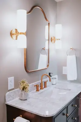 a bathroom with a sink and a mirror at Luxury Cabin getaway with hot tub and stunning views in Strasburg