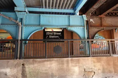 a sign on the side of a bridge at Roomy 4br Walk to Transit connect to NYC in Bayonne