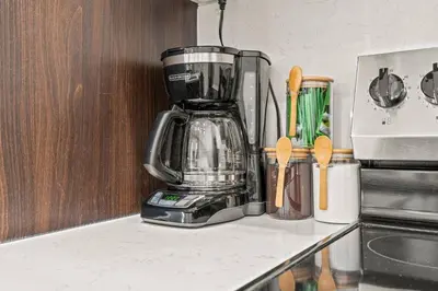 a kitchen counter with a blender on a counter top at Townhouse SLEEP 4 Walk to Liberty Bell |Old City in Philadelphia
