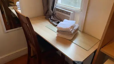 a desk with towels on top of a table at 2218NColoradoC in Philadelphia