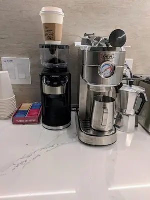 a coffee maker sitting on top of a counter at Double Room at a shared Apartment near Times Square in New York