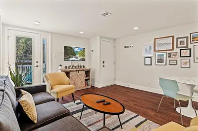a living room with a couch and a table at Washington Square West - Unit A in Philadelphia