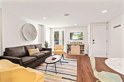 a living room with a couch and a table at Washington Square West - Unit A in Philadelphia
