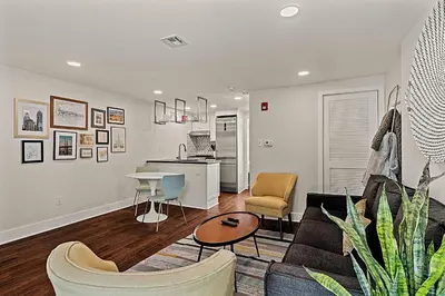 a living room with a couch and a table at Washington Square West Unit B in Philadelphia