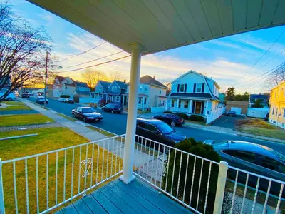 a view from the front porch of a house at Bright, Stylish and Comfy Luxury Room With Workspace! in Haledon