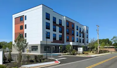 a rendering of an apartment building on a street at 403 Modern Brand New Studio Apartment in Old Bridge