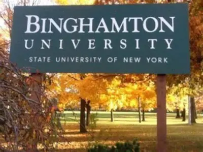 a sign for the binghamton university sign in a park at Relaxing, Calming PR by Binghamton University in Johnson City