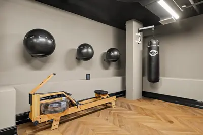a boxing gym with a punching bag on the wall at Freeman 602 by Rove Travel - Condo with Shared Amenities in New York