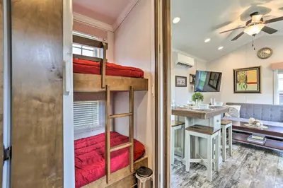 a room with bunk beds in a tiny house at Premium Cottages And Suites At Equestrian House in Pleasant Mount