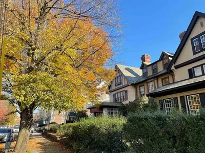 a large house with a tree in front of it at THE ADDAMS HOUSE - LANCASTER HISTORIC DISTRICT in Lancaster